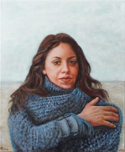 Een portret in olieverf vanb een vrouw aan zee in maart.