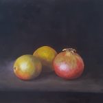 A realistic still life with two mango’s and a pomegranate against a dark background or in an obscure space.